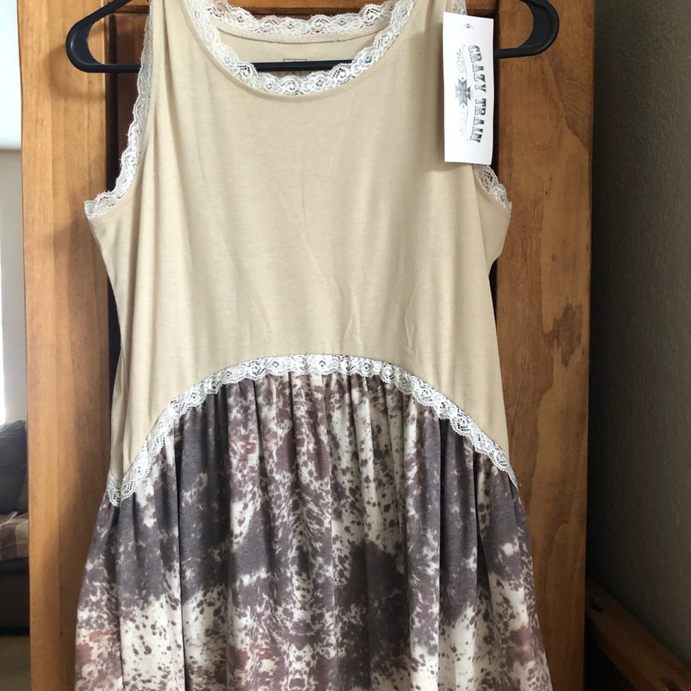 Crazy train cow print tank.